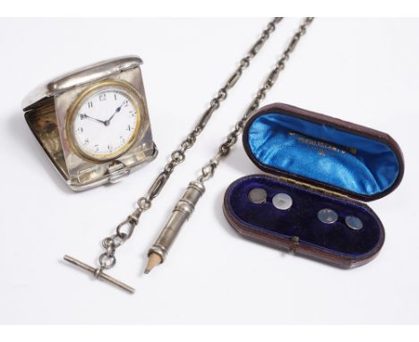A SILVER CASED FOLDING TRAVELLING CLOCK with a plain outer case, timepiece with white enamel dial and Arabic numerals, folded