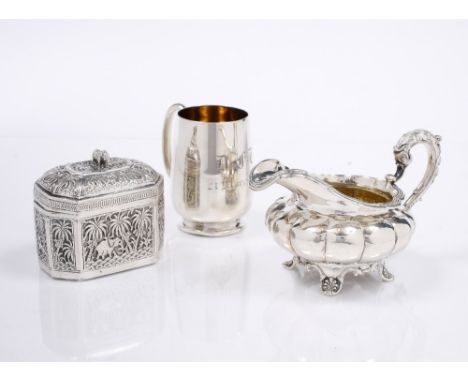 A WILLIAM IV SILVER MILK JUG, of lobed and compressed design, with scroll handle, by Eames & Barnard, London 1830, 7.5 ozs; a