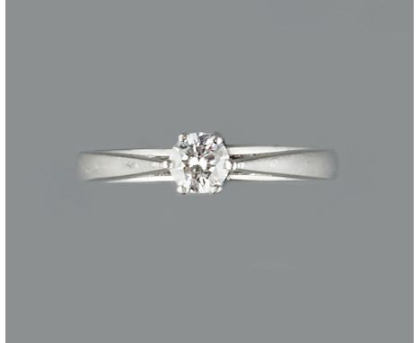 A DIAMOND SINGLE STONE RING, the round brilliant-cut diamond in six claw setting, platinum mounted, diamond weight approximat