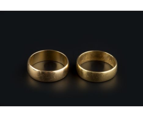 A 22CT GOLD WEDDING BAND, and a yellow precious metal example, first ring size P (2)