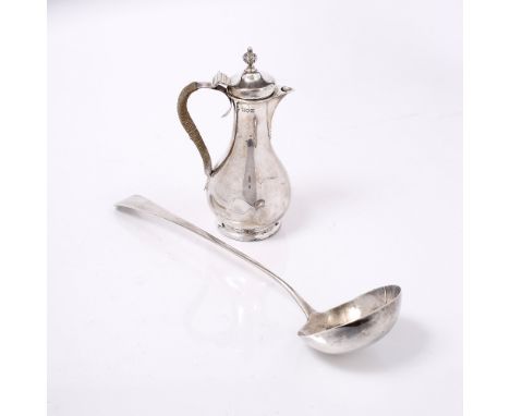 A GEORGE III SILVER SOUP LADLE, London 1792, 33cm long; and a silver baluster coffee pot with hinged rising lid and caned han