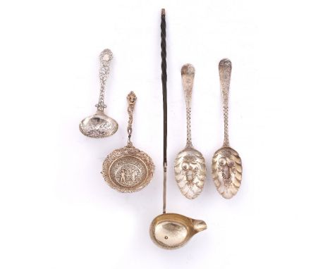 A VICTORIAN SILVER SIFTER SPOON, with pierce decorated bowl and handle, by George Unite, Birmingham 1854; a Georgian toddy la