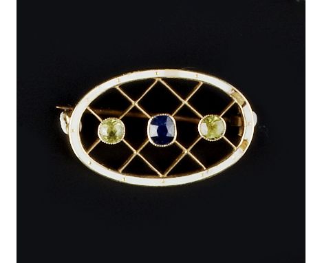 A GEM SET AND ENAMEL PANEL BROOCH, of oval lattice work design, centred with an oval mixed-cut sapphire between two circular 