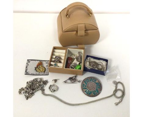 A collection of costume and silver jewellery including a necklace with St Christopher pendant, a brooch with Aztec design, ma