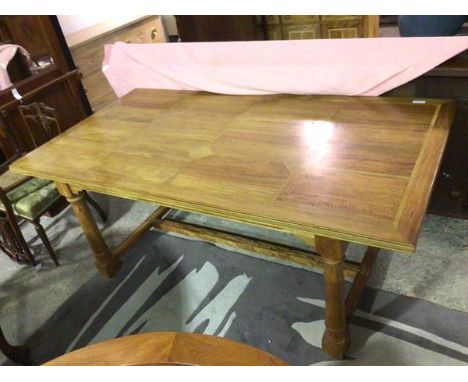 A Flagstone dining table, the oak top with marble inlay, with channelled edges on refectory table style base with turned colu