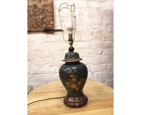 A ceramic Chinese style lamp in the form of a lidded baluster vase, with floral decoration, on wooden base (46cm to top of la