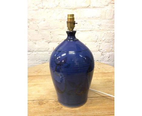 A contemporary ceramic table lamp with blue ground and foliate decoration, stamped St Andrews Pottery to base (35cm to top of