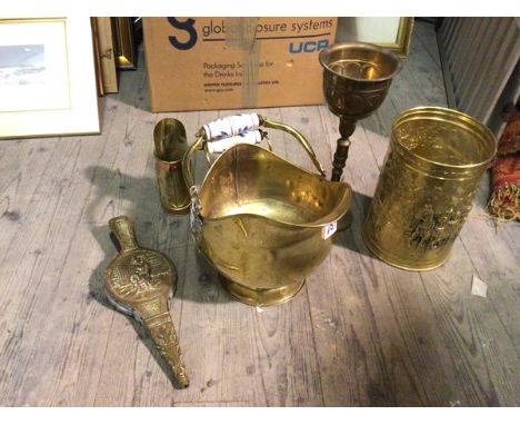 An assortment of brassware including scuttle with ceramic handles, a chalice of baluster form (36cm x 14cm), a pair of bellow