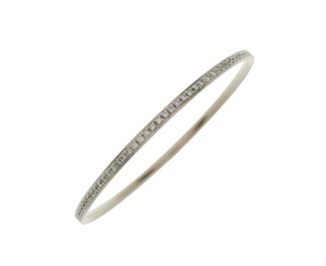 An 18ct gold brilliant-cut diamond bangle, total diamond weight 1.47ct, engraved to mount, estimated I-J colour, VS2-SI clari