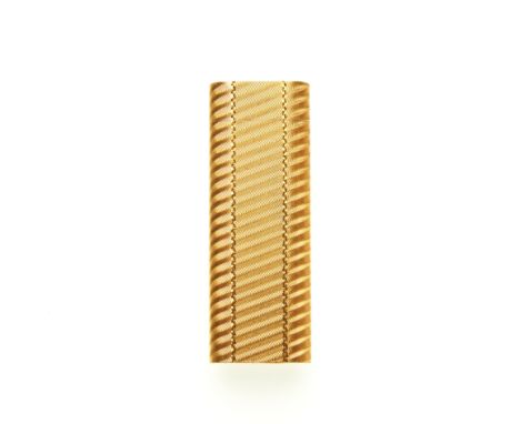 Cartier, a gold plated lighter, featuring a diagonal ribbed body, signed Cartier, measuring 2.5 by 7cm, total weight 83gCondi