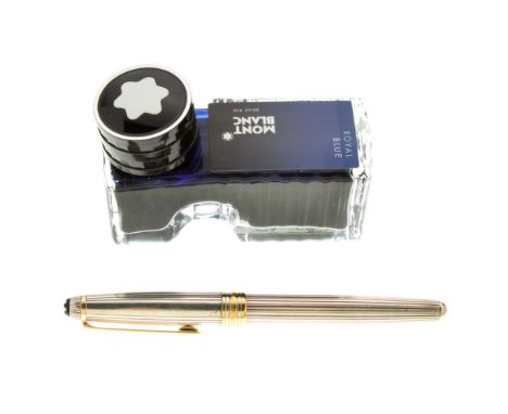 Mont Blanc, a silver Meisterstuck Solitaire fountain pen with writing ink bottle, crafted from lightly ribbed sterling silver