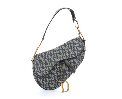 Christian Dior, a Saddle handbag, featuring maker's blue monogram canvas exterior with smooth blue leather trim, flat shoulde