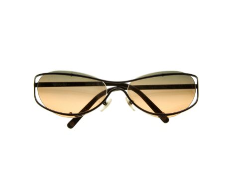 Chanel, a pair of sunglasses, designed with thin black metal frames, brown gradient oval-shaped lenses and maker's small CC l