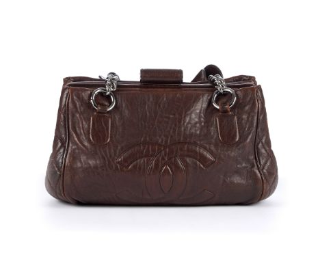 Chanel, a CC Chain Bowling Doctor bag, designed with an aged brown calfskin leather exterior, with diamond quilted detailing,