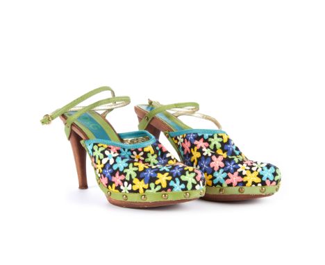 Dolce & Gabbana, a pair of high heel clogs, featuring a floral canvas upper, a green leather wraparound ankle strap fastening