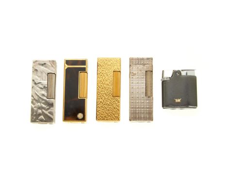 Dunhill, four lighters and a small Ronson lighter, to include a gold-tone bark-effect example, a imitation tortoiseshell exam