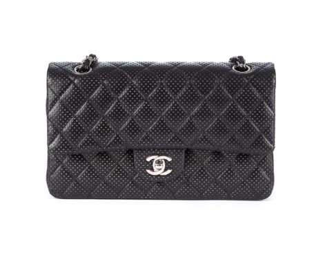 Chanel, a black perforated Medium Double Flap handbag, featuring maker's signature diamond quilted lambskin leather exterior 