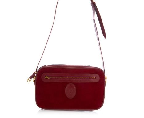 Cartier, a vintage Bordeaux camera bag, crafted from burgundy suede with smooth burgundy leather trim, featuring maker's logo
