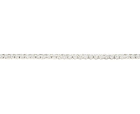 An 18ct gold brilliant-cut diamond line bracelet, with partially concealed push-piece clasp, estimated total diamond weight 7