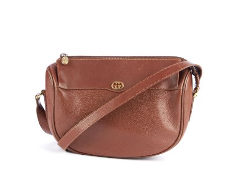 Gucci, a vintage brown leather handbag, featuring maker's gold-tone logo plaque to the centre front, adjustable leather cross