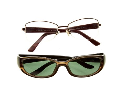 Gucci, two pairs of glasses, to include a pair of sunglasses with brown acetate frames and brown tinted oval lenses, together