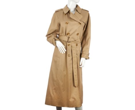 Burberry, a ladies trench coat, designed with a notched lapel collar, buttoned epaulettes, double breasted button fastening, 