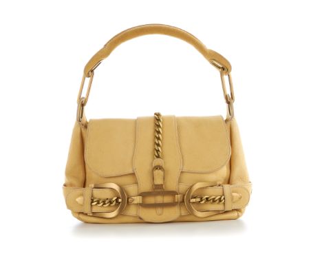 Jimmy Choo, a cream leather Tulita handbag, featuring brushed gold-tone hardware to include chain and buckle details, with a 