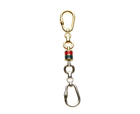 Gucci, a vintage bicolour double sided keyring, signed Gucci, with maker's fitted caseCondition- Overall very good condition-