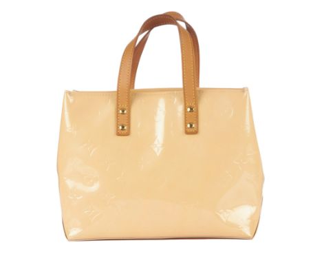 Louis Vuitton, a monogram vernis Reade PM handbag, featuring a cream monogram embossed patent leather exterior, with dual fla