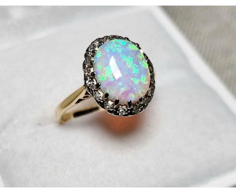  9ct Gold, Opal &amp; Diamond Dress Ring. Size K and weighs 2.9g approx