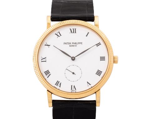 PATEK PHILIPPE Calatrava "Clous de Paris" Armbanduhr, Ref. 3919J. Gelbgold 18K. Handaufzugwerk Kal. 215, funktionsfähig, Revi