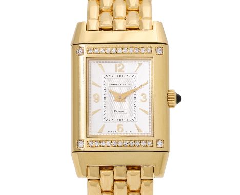 JAEGER LECOULTRE Reverso Lady Ref. 265.1.86 von 1996. 18K Gelbgold. Lünette und Gehäuserückseite mit 90 Diamanten besetzt. Bo