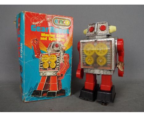 Einco, Horikawa - A vintage Japanese made Einco Wind Up Gear Robot. The plastic robot made by Horikawa (branded with SH withi