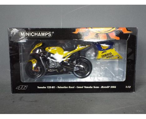 Minichamps - A 1:12 scale Yamaha YZR-M1 Valentino Rossi - Moto GP 2006. The model appears Mint in a Very Good box with light 