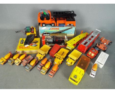 A quantity of play worn diecast models to include matchbox, boxed Solido Bugatti car, boxed Lonestar crane, the dumpy book of