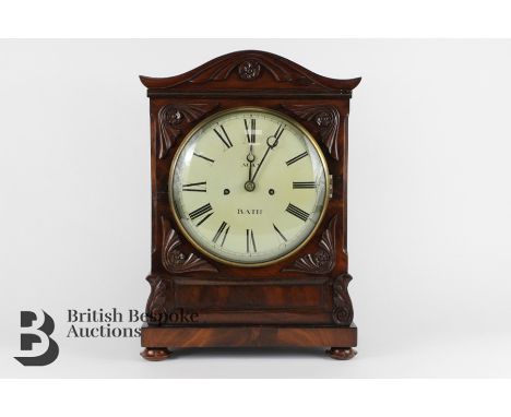 19th century English mahogany cased bracket clock. The clock having a cream enamel face with Roman dial, double fusee 8 day m