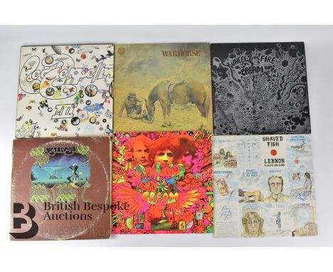 Thirty four rock LP records, including Drama (signed by the drummer Alan White), Yes albums Yesterdays, Going for the One, Ye