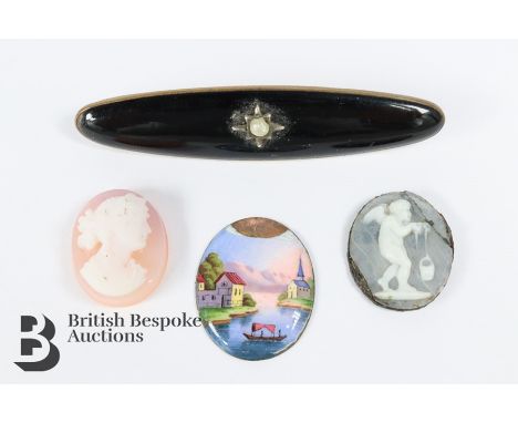 Collection of miscellaneous stones, including two shell cameo, hand painted porcelain plaque, black enamel and pearl brooch.N