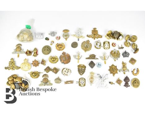 Forty nine cap badges and buttons, including R.N.A.S Armored car cap badge, two Royal Artillery cap badges, two Royal Enginee