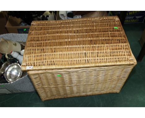 A large wicker hamper and contents