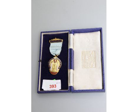 An enamel and gilt metal Masonic Steward's medal, Province Of Warwickshire, 1950, cased.
