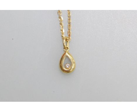 Chopard, a "Happy Diamonds" pendant, the "floating" brilliant-cut stone within a pear shaped glazed mount on a fancy link cha