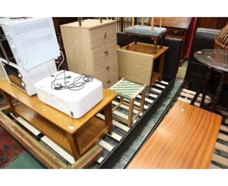 A group of furniture comprising a double bed, an oak occasional table, a footstool, a ropework stool, a stool, chest of drawe