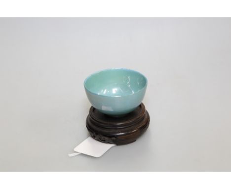 A small Royal Doulton 'Titanium' ware Chinese celadon style mottled green lustre bowl, bears printed mark to base and on a Ch