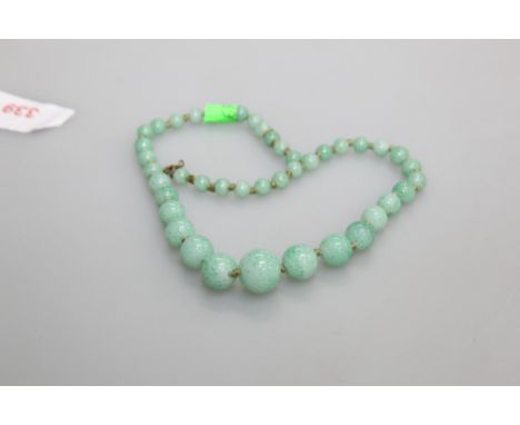 A jade coloured hardstone necklace