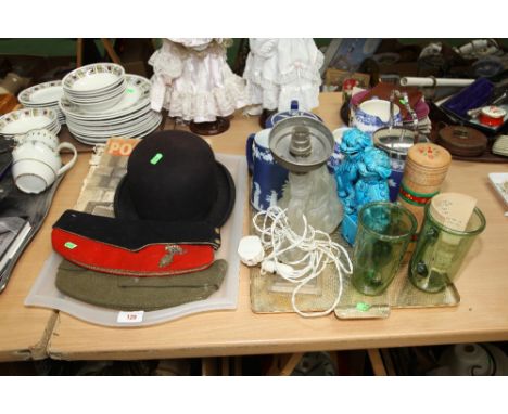 Two trays inc. bowler hat, military caps, war time periodicals, Wedgwood jasperware, a dolphin form glass table lamp etc