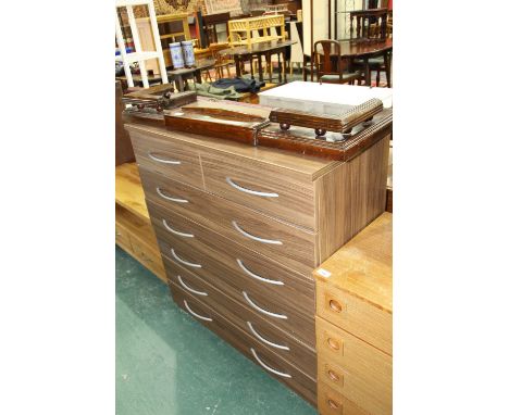 A chest of drawers and a fender