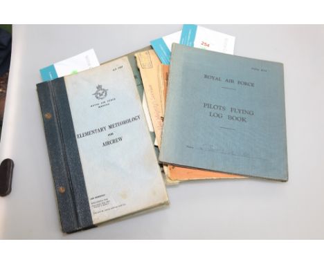 A Royal Air Force Pilot's training log book 1941-1943 and a Royal Air Force Pilots Flying log book for 1945-1946 for Lt J. Sw