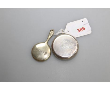A silver compact, Birmingham 1930, tog. with a miniature silver hand mirror, Birmingham 1919