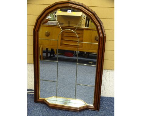 A STYLISH MAHOGANY EFFECT WALL MIRROR with small lower shelf, 104cms height, 67cms width